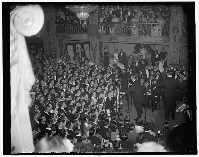 Ray Bolger, rubber-legged dancing start of screen and stage, entertains the huge crowd attending the President’s Birthday Ball at the Mayflower Hotel, 1/29/38. - Tap Dance in America collection